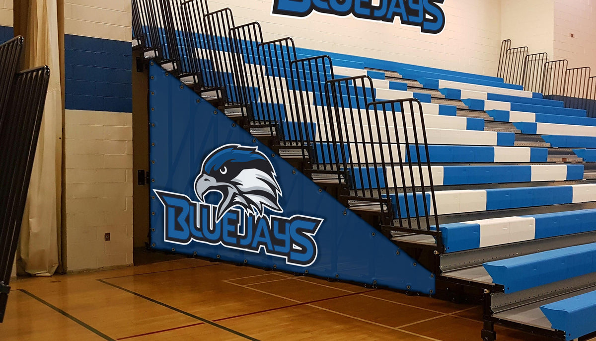 Indoor bleacher seating with custom branding display, ideal for gym banners and stadium section covers in sports venues