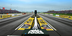 NHRA drag racing windscreen with bold sponsor graphics on fence, ideal for athletic windscreen and event banners