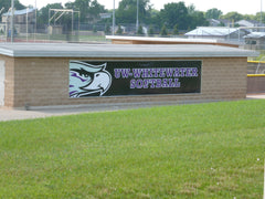 Whitewater Duratrac dugout skin on softball field showing dynamic branding wrap across dugout front for venue decor & team identity.