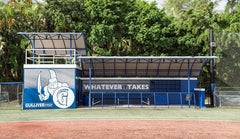Dugout graphics wrap showcasing full-color custom branding on baseball facility dugout front for team identity & venue décor.