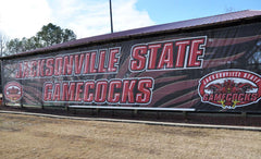 Dugout graphics wrap highlighting full-color custom branding on baseball facility dugout front for team identity & venue décor.