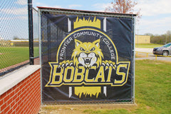 Dugout full-color graphic wrap displaying custom team branding across the front of a baseball facility dugout for venue identity.