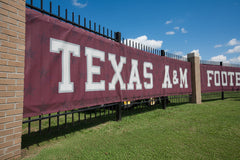 Duramesh mesh fence windscreen with custom athletic graphics — ideal for stadium fences, gyms, locker rooms, or sports fields.