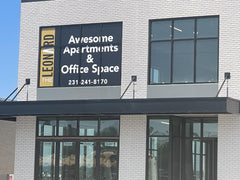 Micro dot window graphics covering storefront glass, ideal for window wraps and window graphics with outside visibility