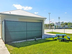 Chain link fence privacy screen with custom mesh graphics for outdoor sports fields, events, yards, and facility windscreen.