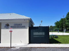 Chain link fence privacy screen with custom mesh graphics for outdoor privacy, fields, events, yards, and facility windscreen.