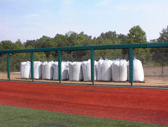 Stadium rail padding with durable printed graphics and team branding installed along sidelines for safety and visual impact.