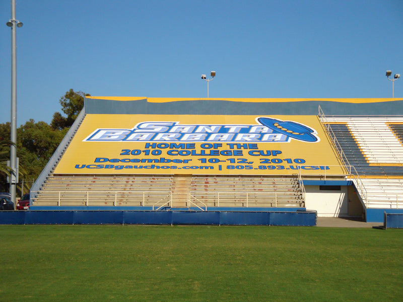 Santa Barbara College Cup bleacher section cover stretched over empty stadium seats